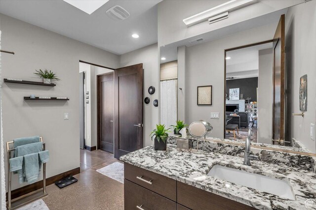 644 W Wild Indigo Way, Ivins, UT 84738 - full bathroom featuring recessed lighting, visible vents, vanity, and baseboards
