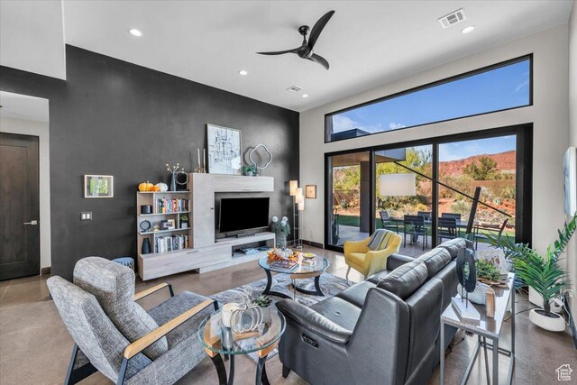 644 W Wild Indigo Way, Ivins, UT 84738 - living area featuring visible vents, recessed lighting, a ceiling fan, and a high ceiling