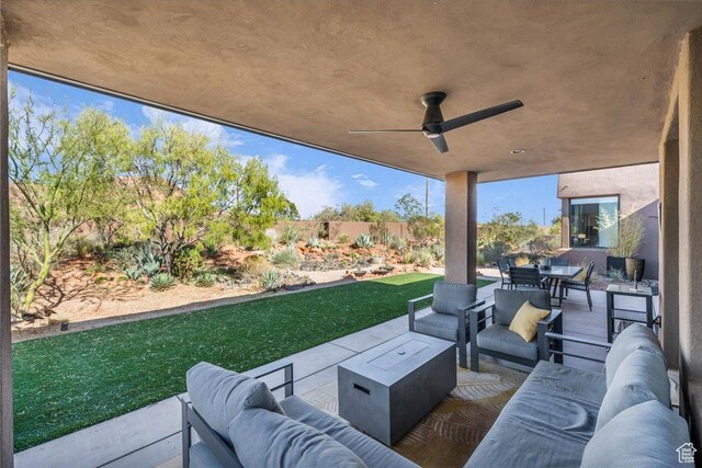 644 W Wild Indigo Way, Ivins, UT 84738 - view of patio / terrace featuring an outdoor hangout area, a ceiling fan, outdoor dining space, and fence