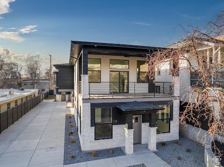 136 S 700 E Unit 1, Salt Lake City, UT 84102 - view of front of property featuring a patio area and a balcony