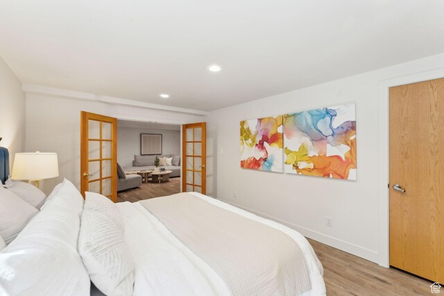 3797 Blacksmith Rd, Park City, UT 84098 - bedroom featuring french doors, light wood finished floors, recessed lighting, and baseboards