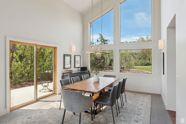 3797 Blacksmith Rd, Park City, UT 84098 - dining area featuring plenty of natural light, high vaulted ceiling, and baseboards