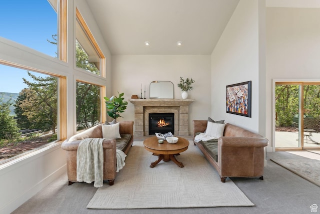 3797 Blacksmith Rd, Park City, UT 84098 - carpeted living area featuring high vaulted ceiling, a fireplace, baseboards, and recessed lighting