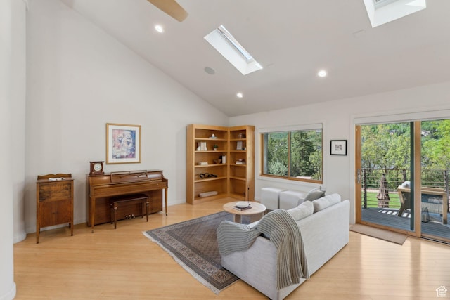 3797 Blacksmith Rd, Park City, UT 84098 - living room with a skylight, light wood-style floors, recessed lighting, and high vaulted ceiling