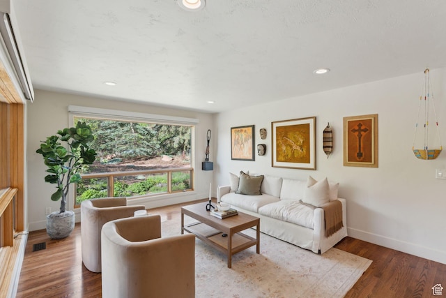 3797 Blacksmith Rd, Park City, UT 84098 - living room with wood finished floors, baseboards, and recessed lighting