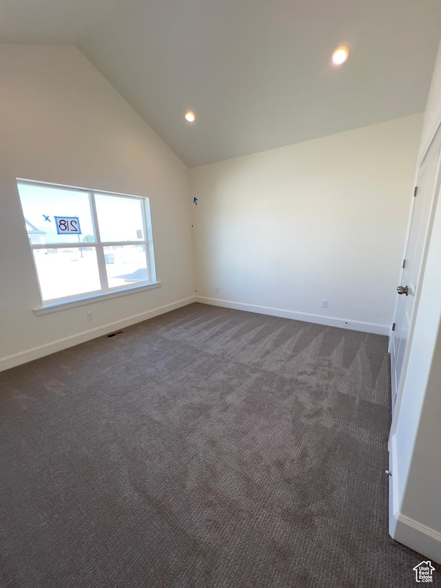 1491 N Starry Way Unit 218, Saratoga Springs, UT 84045 - empty room with lofted ceiling, dark carpet, recessed lighting, and baseboards