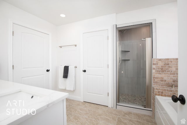 14714 S Pristine Dr E, Draper, UT 84020 - bathroom featuring vanity, a bathtub, and a tile shower