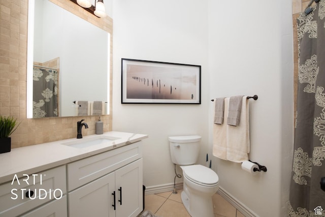 14714 S Pristine Dr E, Draper, UT 84020 - bathroom with vanity, toilet, tile patterned floors, baseboards, and tasteful backsplash