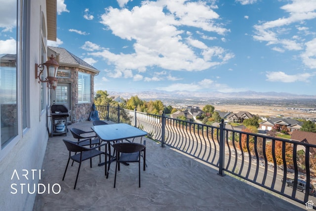 14714 S Pristine Dr E, Draper, UT 84020 - view of patio / terrace with a mountain view, a balcony, a residential view, and area for grilling
