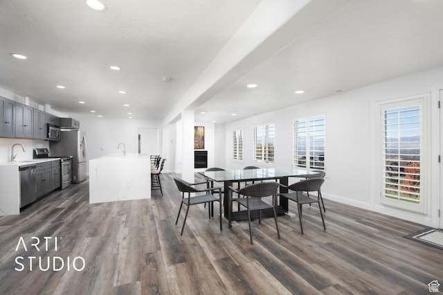 14714 S Pristine Dr E, Draper, UT 84020 - dining area featuring baseboards, recessed lighting, and dark wood-type flooring