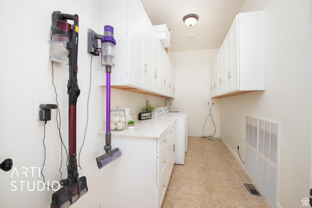 14714 S Pristine Dr E, Draper, UT 84020 - clothes washing area featuring cabinet space, baseboards, and visible vents