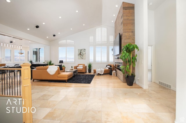 14714 S Pristine Dr E, Draper, UT 84020 - living area featuring visible vents, recessed lighting, baseboards, and high vaulted ceiling