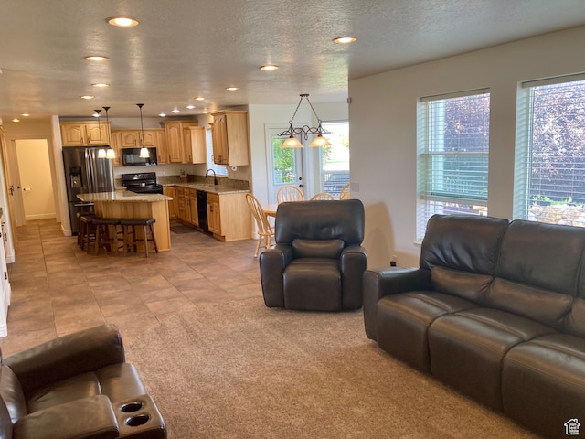 5046 W 4250 S, West Haven, UT 84401 - living area featuring recessed lighting, light carpet, a textured ceiling, and light tile patterned floors