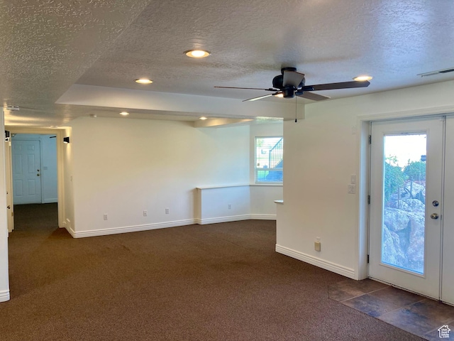 5046 W 4250 S, West Haven, UT 84401 - spare room with a textured ceiling, dark colored carpet, recessed lighting, and baseboards