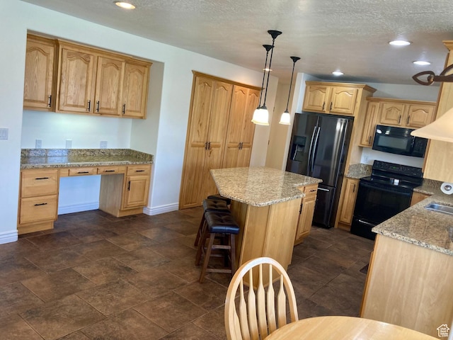 5046 W 4250 S, West Haven, UT 84401 - kitchen featuring black appliances, built in desk, hanging light fixtures, and light stone counters