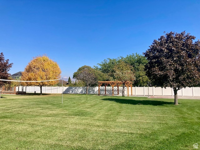5046 W 4250 S, West Haven, UT 84401 - view of yard with fence, a pergola, and volleyball court