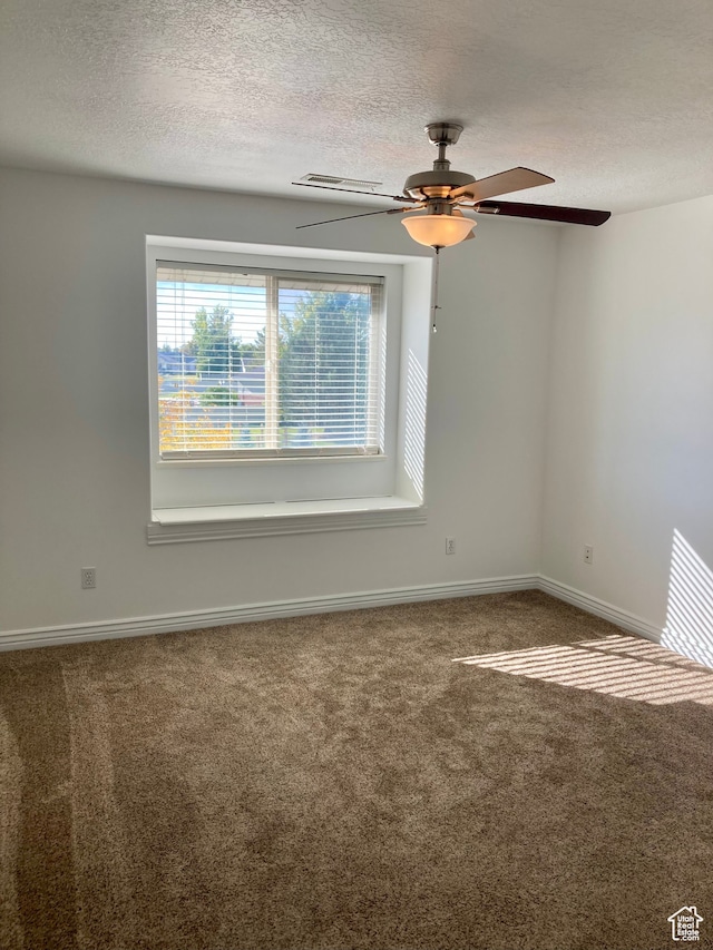 5046 W 4250 S, West Haven, UT 84401 - spare room featuring a textured ceiling, carpet, a ceiling fan, and baseboards