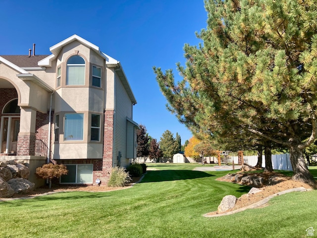 5046 W 4250 S, West Haven, UT 84401 - view of yard featuring fence and a shed