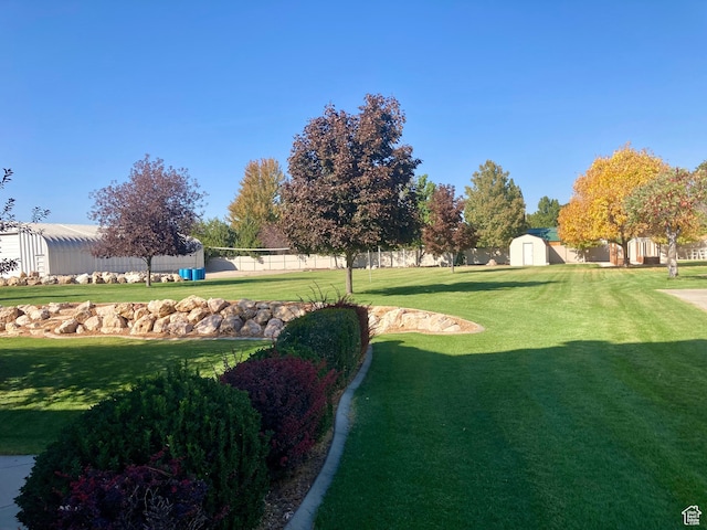 5046 W 4250 S, West Haven, UT 84401 - surrounding community with an outbuilding, a yard, a storage shed, and fence