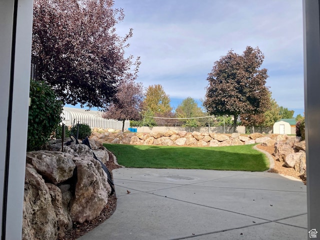 5046 W 4250 S, West Haven, UT 84401 - view of yard featuring a shed, fence, and an outdoor structure