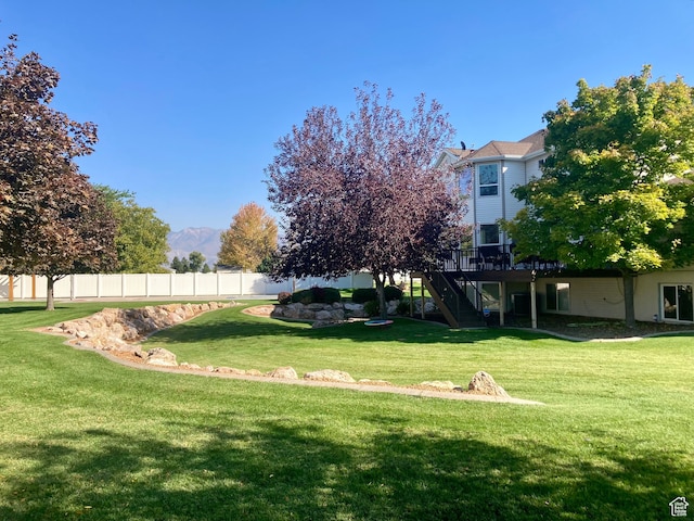5046 W 4250 S, West Haven, UT 84401 - view of yard with stairs, a deck, and fence