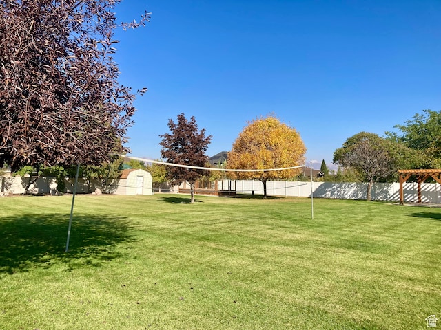 5046 W 4250 S, West Haven, UT 84401 - view of community with fence, volleyball court, and a lawn