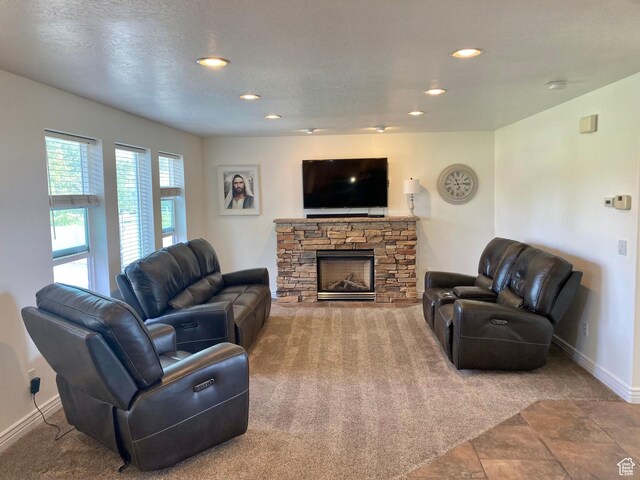 5046 W 4250 S, West Haven, UT 84401 - living area with recessed lighting, a fireplace, a textured ceiling, and baseboards