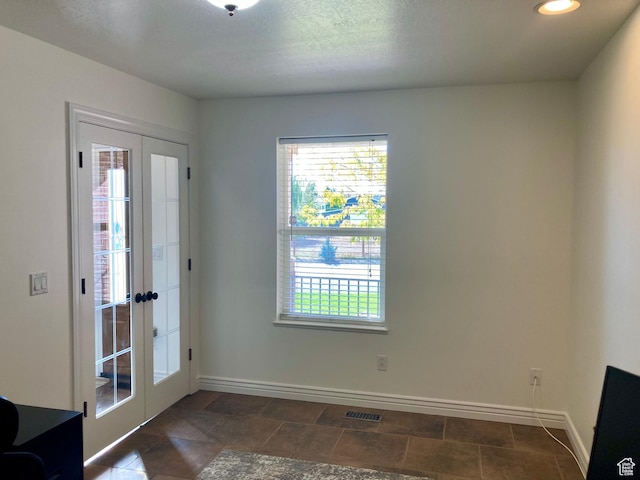 5046 W 4250 S, West Haven, UT 84401 - entryway featuring baseboards, a wealth of natural light, and french doors