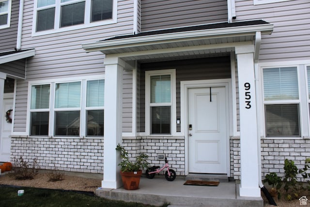 953 N 900 W, Tremonton, UT 84337 - doorway to property with stone siding
