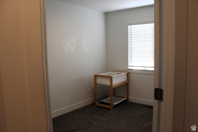 953 N 900 W, Tremonton, UT 84337 - interior space featuring dark carpet and baseboards