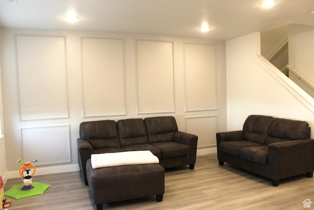 953 N 900 W, Tremonton, UT 84337 - living room featuring light wood-style flooring, baseboards, recessed lighting, and a decorative wall