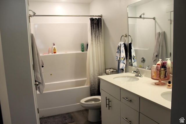 953 N 900 W, Tremonton, UT 84337 - bathroom with double vanity, shower / bath combo with shower curtain, toilet, and a sink