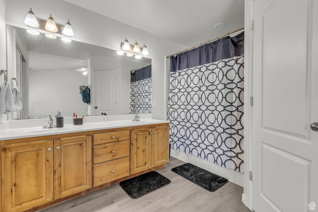 83 N 380 W, Orem, UT 84057 - bathroom with double vanity, wood finished floors, and a sink