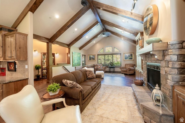 10569 S Covered Bridge Dr, Spanish Fork, UT 84660 - living area with wood finished floors, beam ceiling, high vaulted ceiling, recessed lighting, and a stone fireplace