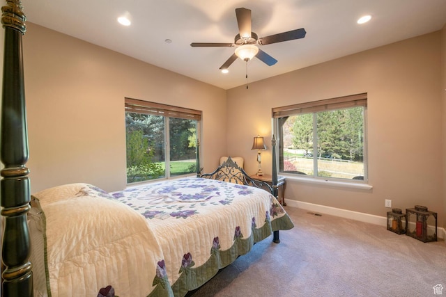 10569 S Covered Bridge Dr, Spanish Fork, UT 84660 - carpeted bedroom featuring multiple windows, baseboards, recessed lighting, and a ceiling fan