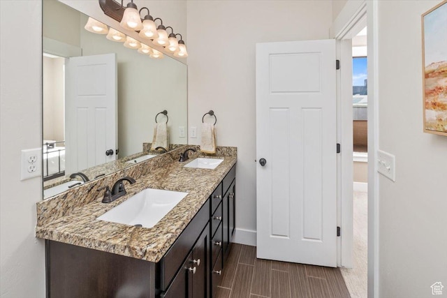 317 E Park Blvd, Ogden, UT 84401 - full bath featuring double vanity, a sink, and baseboards