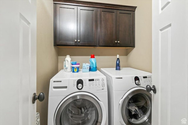 317 E Park Blvd, Ogden, UT 84401 - clothes washing area featuring cabinet space and washing machine and dryer