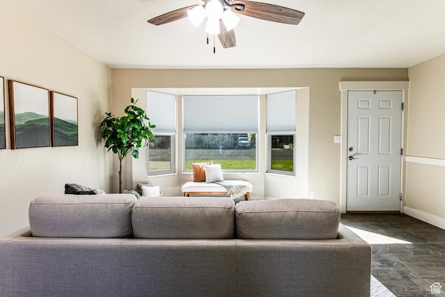685 E 600 N, Spanish Fork, UT 84660 - living area with dark wood-style floors, ceiling fan, and baseboards