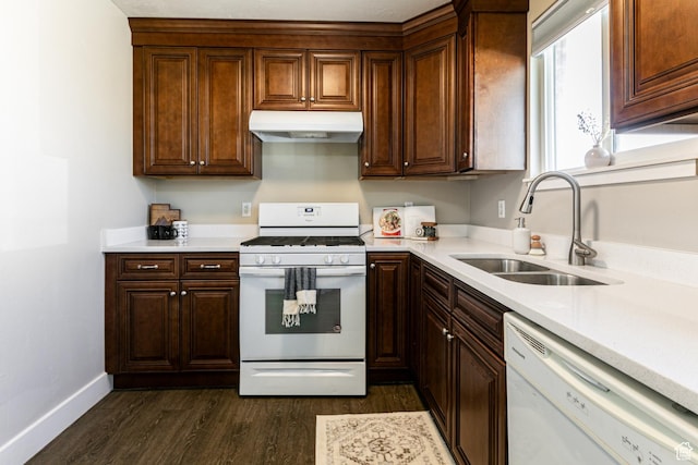 685 E 600 N, Spanish Fork, UT 84660 - kitchen with white appliances, under cabinet range hood, a sink, and light countertops