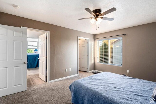 2668 N 550 W, Cedar City, UT 84721 - bedroom with carpet flooring, baseboards, a textured ceiling, and a ceiling fan