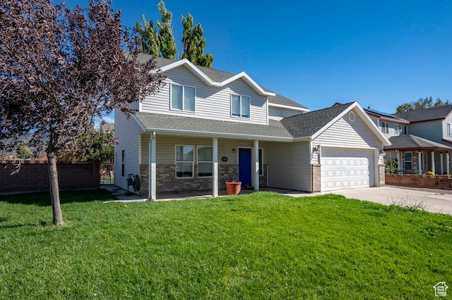 2668 N 550 W, Cedar City, UT 84721 - view of front of house with a front yard and a garage