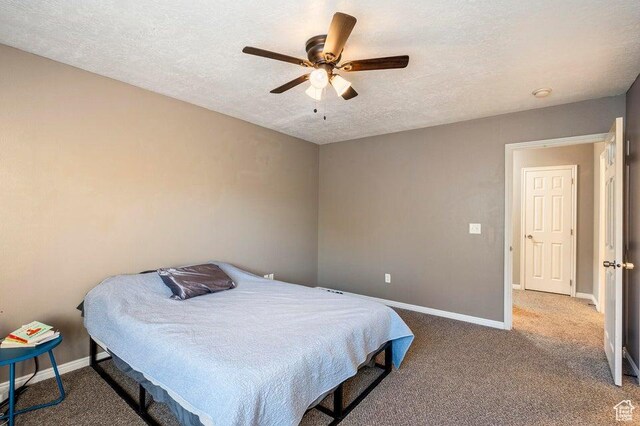 2668 N 550 W, Cedar City, UT 84721 - bedroom with baseboards, carpet, a textured ceiling, and a ceiling fan