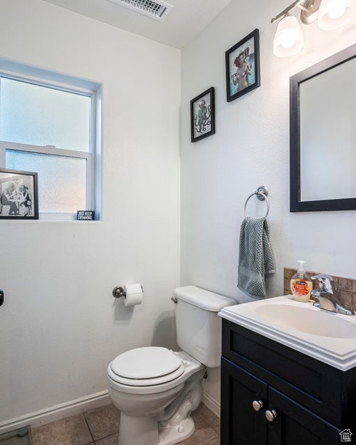 2668 N 550 W, Cedar City, UT 84721 - bathroom with toilet, vanity, and tile patterned flooring