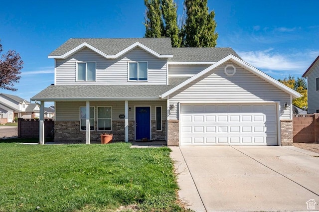 2668 N 550 W, Cedar City, UT 84721 - traditional-style home with driveway, roof with shingles, a garage, and covered porch