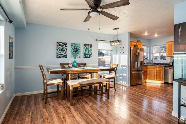 2668 N 550 W, Cedar City, UT 84721 - dining space featuring dark wood finished floors, baseboards, and a ceiling fan