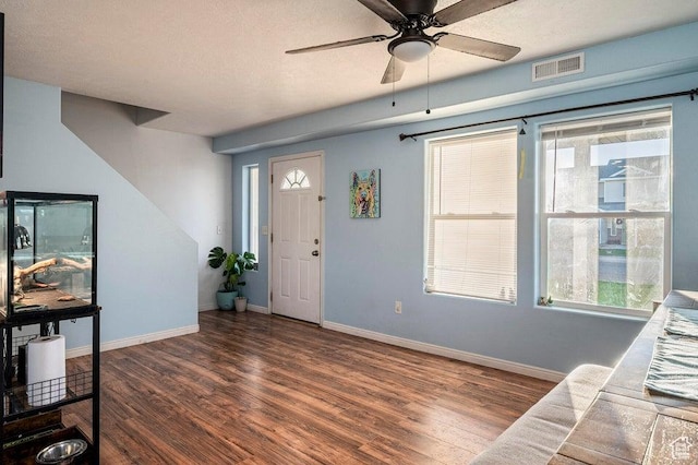 2668 N 550 W, Cedar City, UT 84721 - entryway with wood finished floors, ceiling fan, baseboards, healthy amount of natural light, and a textured ceiling