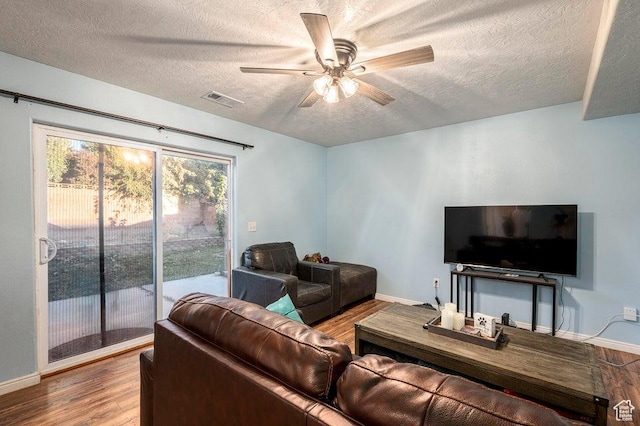 2668 N 550 W, Cedar City, UT 84721 - living area with a textured ceiling, wood finished floors, a ceiling fan, and baseboards