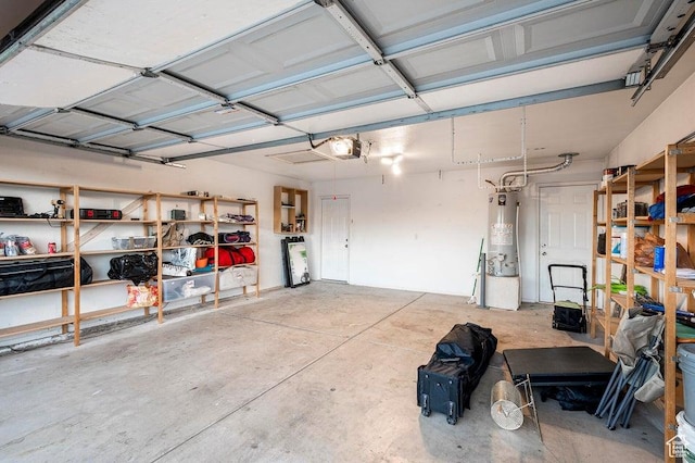 2668 N 550 W, Cedar City, UT 84721 - garage featuring water heater and a garage door opener