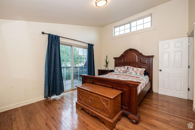 325 E 100 N, Willard, UT 84340 - bedroom featuring access to outside, wood finished floors, and baseboards