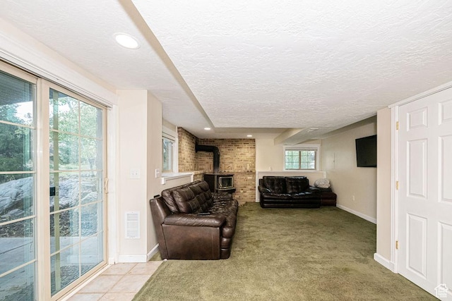325 E 100 N, Willard, UT 84340 - carpeted living area featuring a wood stove, a textured ceiling, baseboards, and recessed lighting